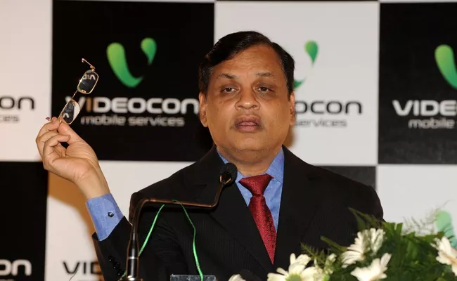 Sebi orders attachment of bank demat MF accounts of Videocon Dhoot - Sakshi