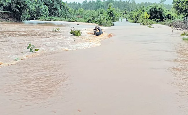 Heavy Rains And Floods All Over Andhra Pradesh - Sakshi