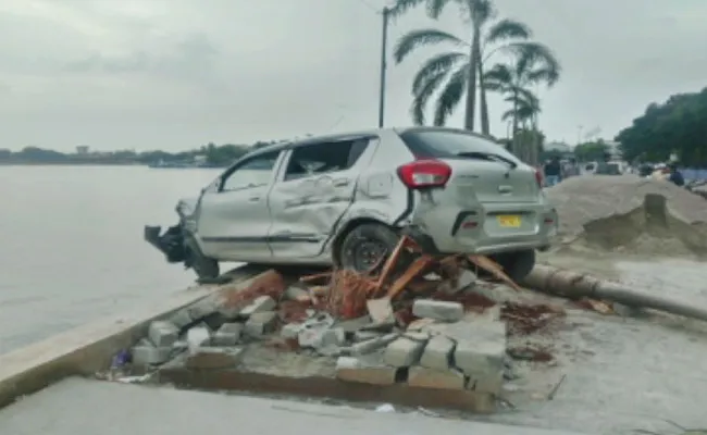 Car Accident At NTR Marg In Hussain Sagar - Sakshi