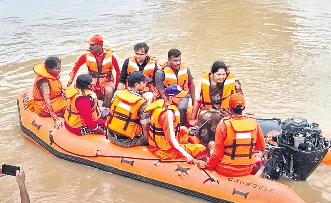 funerals of those who died due to floods have been completed - Sakshi