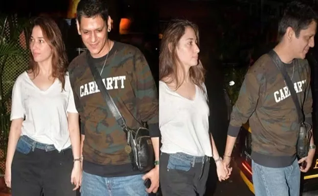 Tamannaah Bhatia and Vijay Varma hold hands on a date in Mumbai - Sakshi