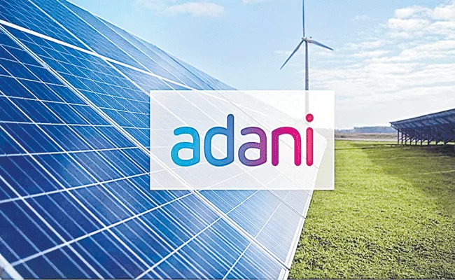 Adani Green weighs raising Rs 12300 cr to fund expansion - Sakshi