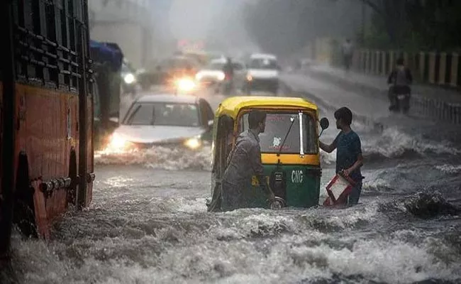 Rain Lashes Delhi And IMD Forecasts Heavy Rainfall In Many States - Sakshi