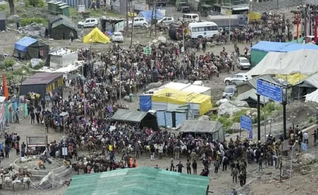 Amarnath yatra suspended for second day due to heavy rain, landslides - Sakshi