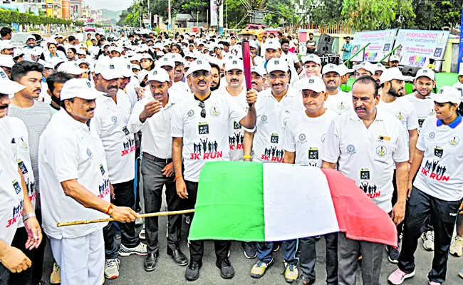 An exciting 3K run in Vijayawada - Sakshi