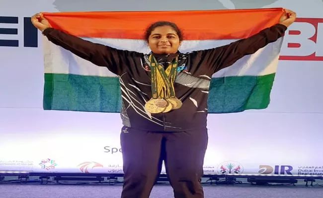 Telangana Teen Virinchi Swapnika Won Gold Medal In Asian University Power Lifting Games - Sakshi