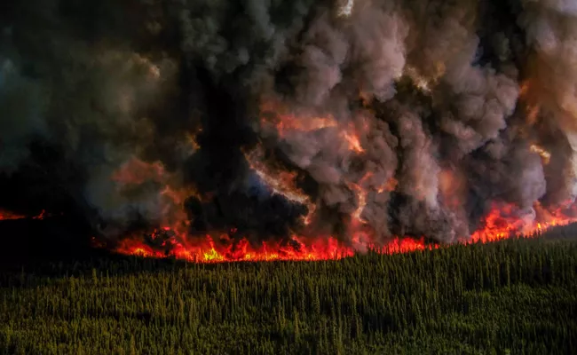 Massive wildfire burning across Canada and Usa - Sakshi