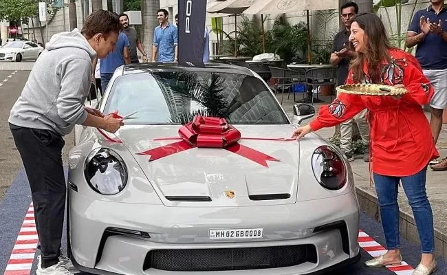 Angel one ceo Dinesh Thakkar new Porsche 911 GT3 Touring car price and details - Sakshi