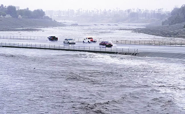 Hilary drenches Southern California with record-breaking rainfall as storm winds - Sakshi