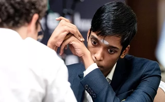 Indias Praggnanandhaa defeats Fabiano Caruana in tiebreaks - Sakshi