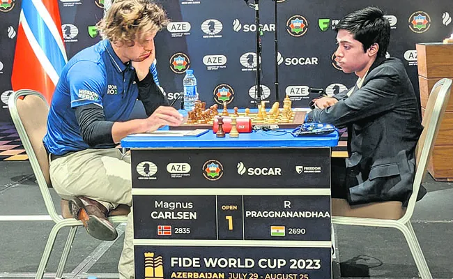 Pragnananda and Carlsons first game draw - Sakshi