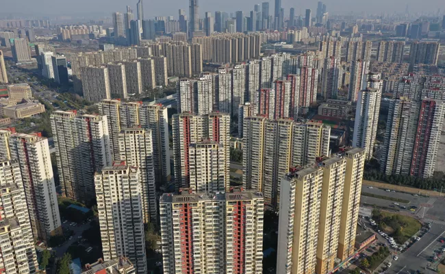 China economy in trouble with real estate companies - Sakshi