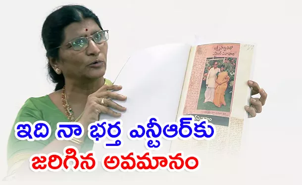 Lakshmi Parvathi Fire On Daggubati Purandeswari Over NTR Coin Event - Sakshi