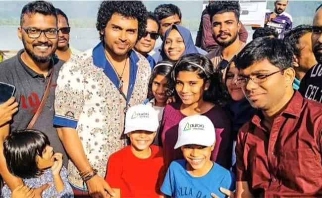 karthi Click With Fans From Japan Shooting Spot - Sakshi