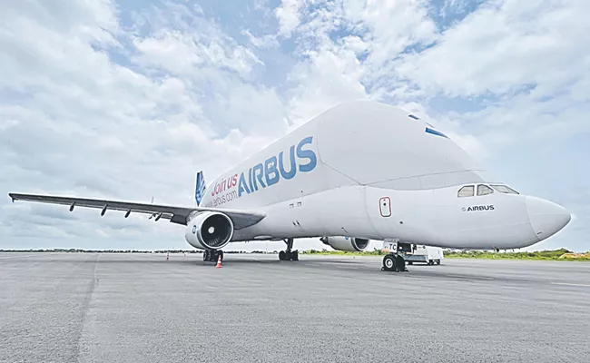 Beluga plane once again landed at Shamshabad International Airport - Sakshi