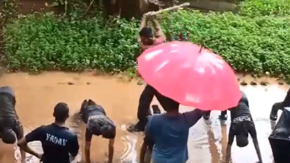 NCC Cadets Face Down In Puddle Amid Rain By Senior - Sakshi