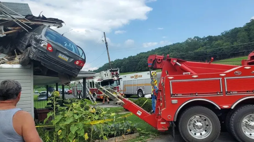 Car Crashes Into The Second Floor Of A House In Pennsylvania - Sakshi