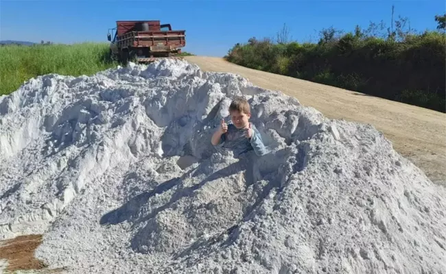 Boy Dies Minutes After Playing In Mountain Of Taxic Limestone Dust - Sakshi