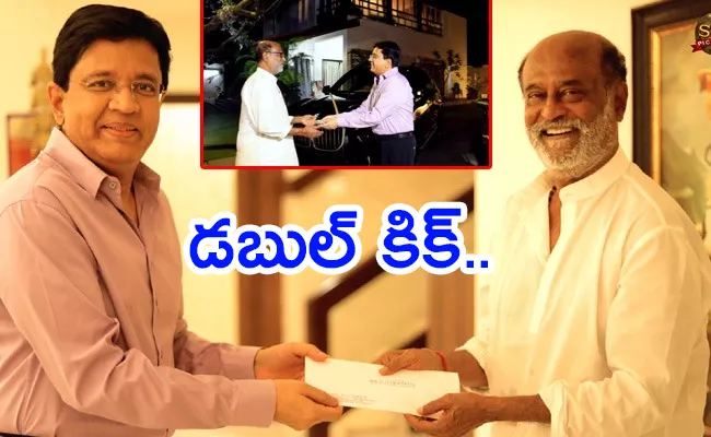 Kalanithi Maran Handed Over Cheque To Rajinikanth - Sakshi