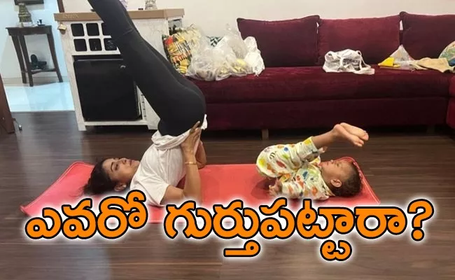 Actress Shriya Saran Workout Pic With Daughter - Sakshi