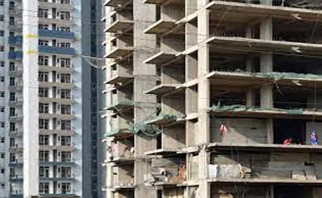 workers killed as lift free falls at under-construction society in Greater Noida - Sakshi