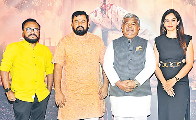 Razakar teaser released by goshamal mla rajasingh - Sakshi