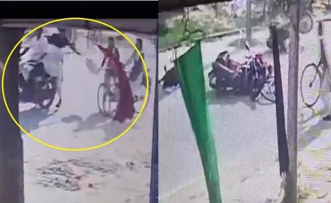 Bike Runs Over Girl After 2 Men Pull Her Scarf - Sakshi