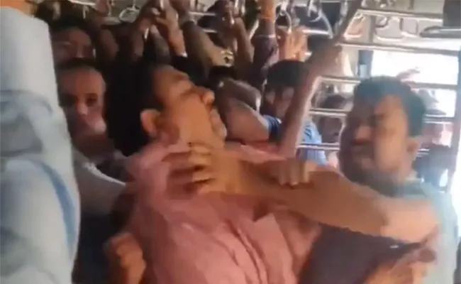 Passengers Fight for Seats Mumbai Local Train - Sakshi