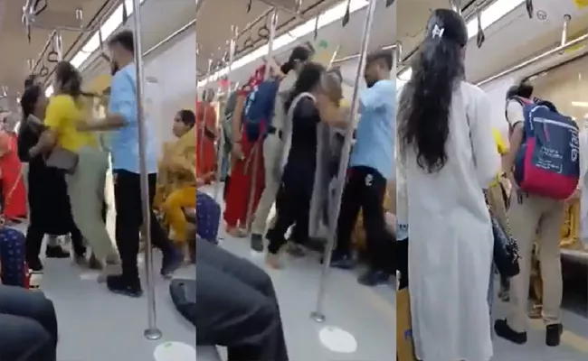 Two Women hit Each Other In an Ugly Fight inside Delhi metro - Sakshi