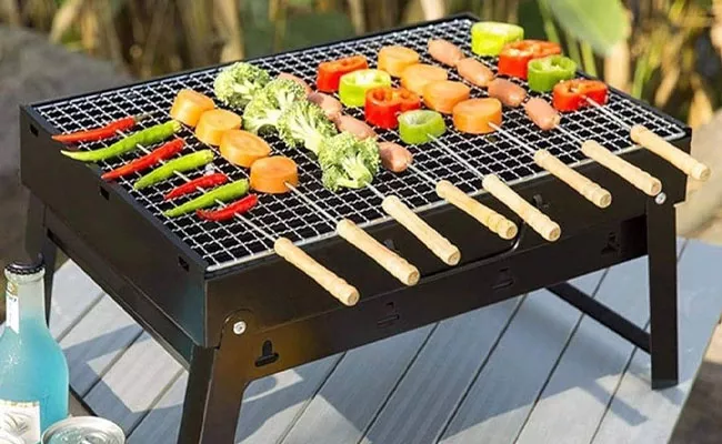 Portable Outdoor Grill To Cook Different Food Items - Sakshi