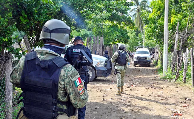 16 Killed, Including 12 Police Officers In Armed Attacks In Mexico - Sakshi