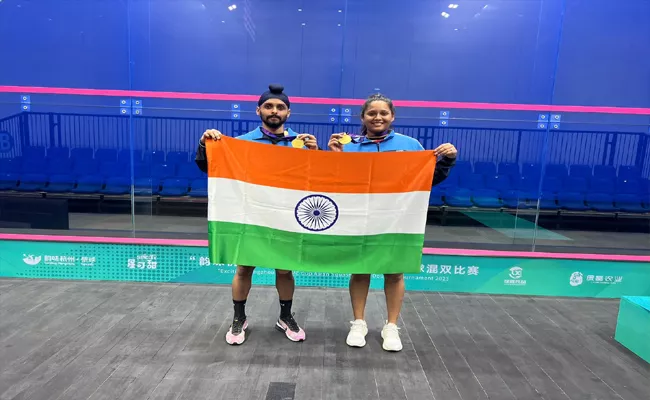 Dipika Pallikal-Harinderpal Singh Sandhu clinch gold in Squash mixed doubles - Sakshi