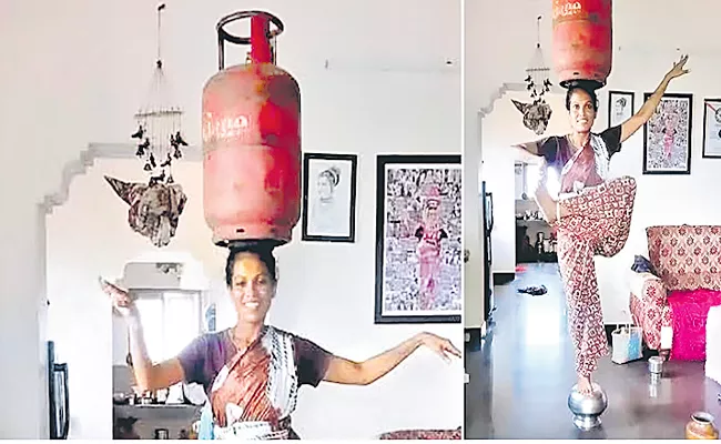 Woman dances with gas cylinder on her head - Sakshi