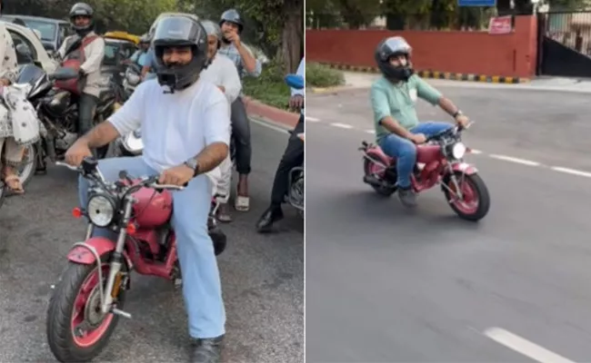 Viral Video Of Man Riding Mini Pink Bullet On Delhi Street Stuns Internet - Sakshi