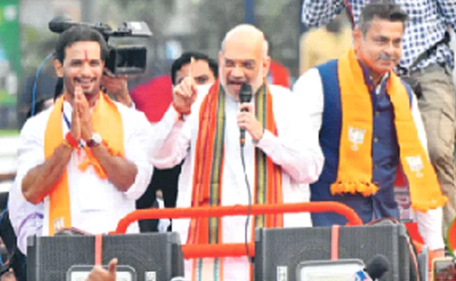 development of Telangana with double engine government Amit Shah - Sakshi