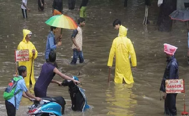 Chennai Waterlogged After Heavy Rain Schools shut More Showers forecast - Sakshi