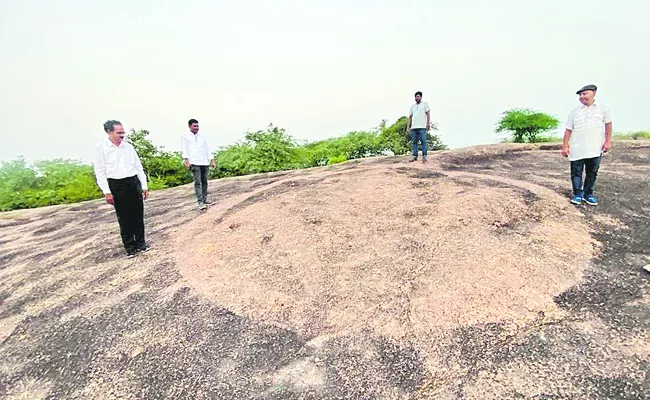 huge 3 thousand year old geoglyph on a mound near Medchal - Sakshi