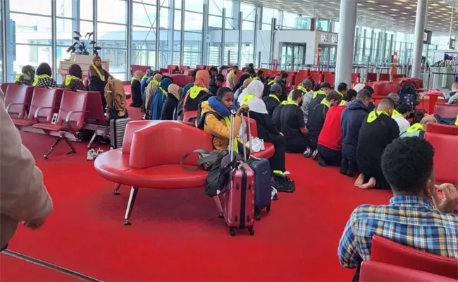 People Gathered for Namaz at the Airport - Sakshi