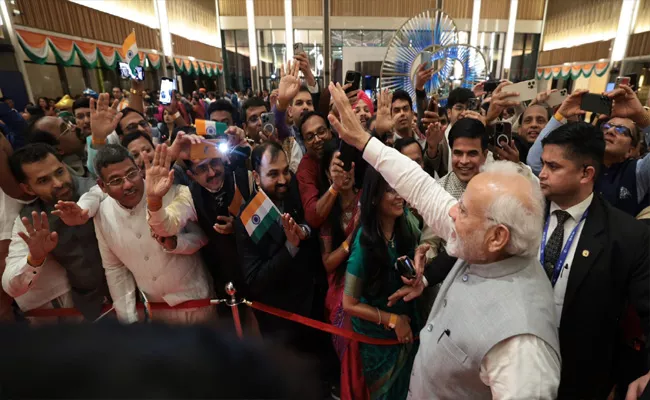 PM Modi in Dubai For Climate Action Summit Gets Warm Welcome - Sakshi