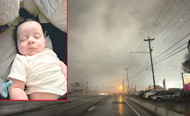 USA: Four-month-old baby sucked up by Tornado found alive on tree - Sakshi