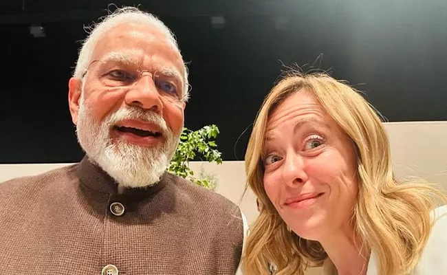 Italy Prime Minister Giorgia Meloni took Selfie with PM Modi - Sakshi