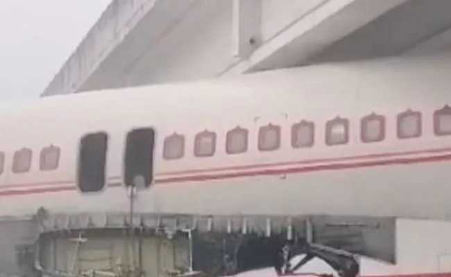 Plane Gets Stuck Under Bridge In Bihar Video Viral - Sakshi