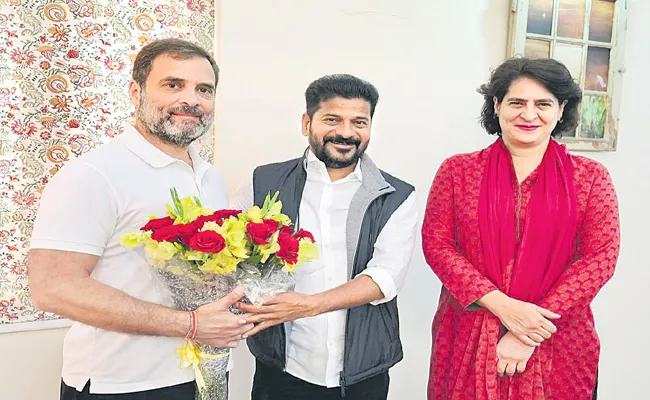 Sonia And Rahul Gandhi Attending To Revanth Reddy CM Oath - Sakshi