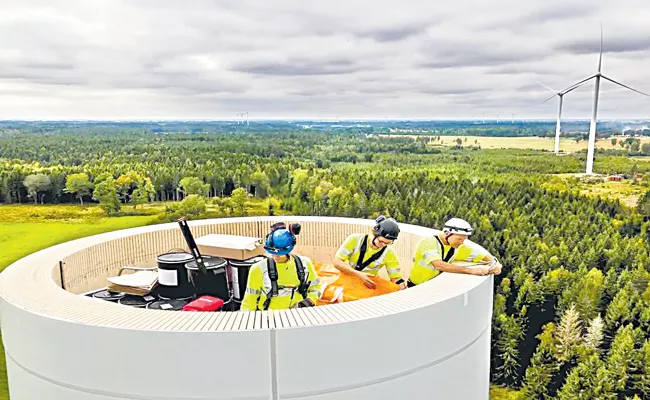 World tallest wooden wind turbine starts turning - Sakshi