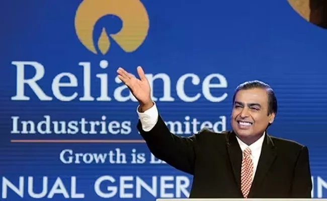 RIL shares at record high market cap crosses Rs 18 lakh crore - Sakshi