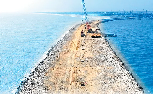 Fast forward port construction works - Sakshi