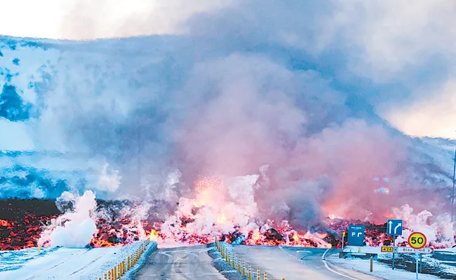 Iceland volcano: Iceland volcano erupts with lava fountains, disrupts heating and roads - Sakshi