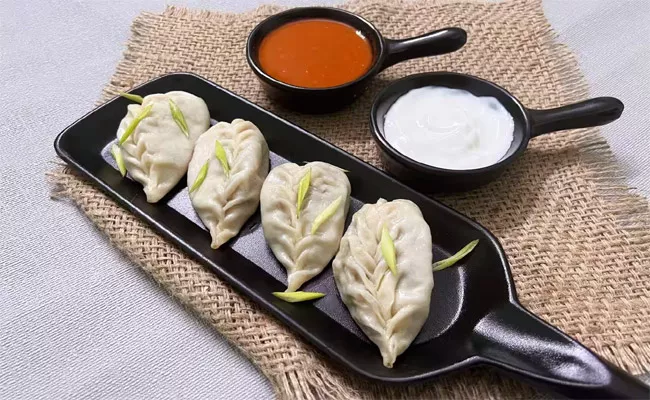 Unlimited Momos in RS 129 At Tilak Nagar Delhi - Sakshi