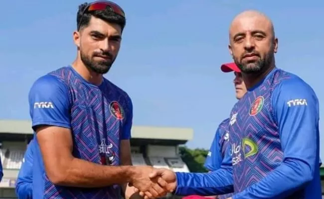 SL Vs AFG Only Test: Ibrahim Zadran Presents Debut Cap To Uncle Noor Ali Zadran - Sakshi