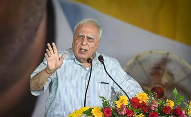 Kapil Sibal Comments On Ec Arun Goel Resignation - Sakshi